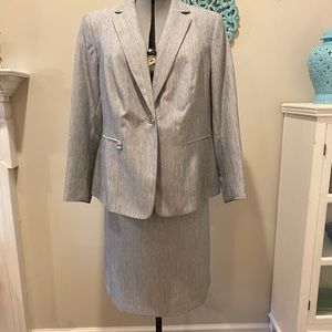 Women’s suit.  2 piece Silver grey 18